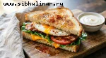 Сэндвич с яйцом, беконом и сыром чеддер