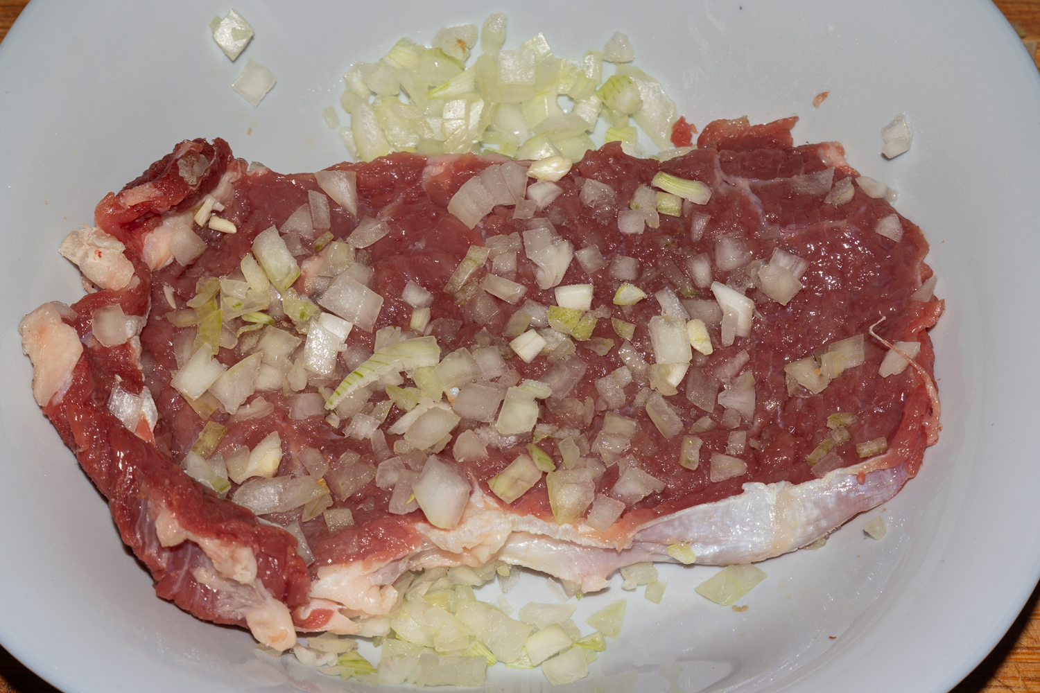 мясо с луком по рецепту Шницель с чесноком