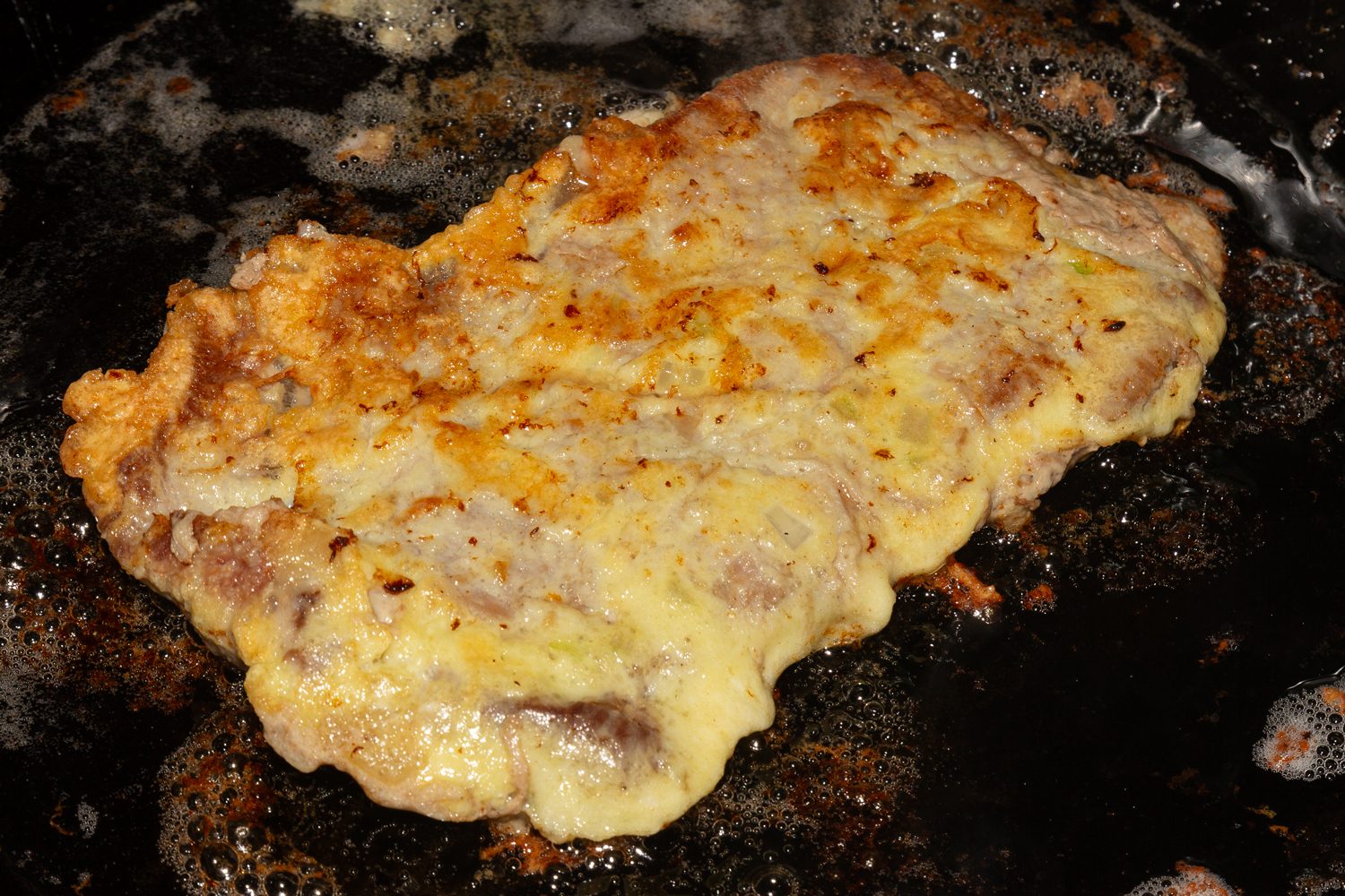 обжаренное мясо по рецепту Шницель с чесноком