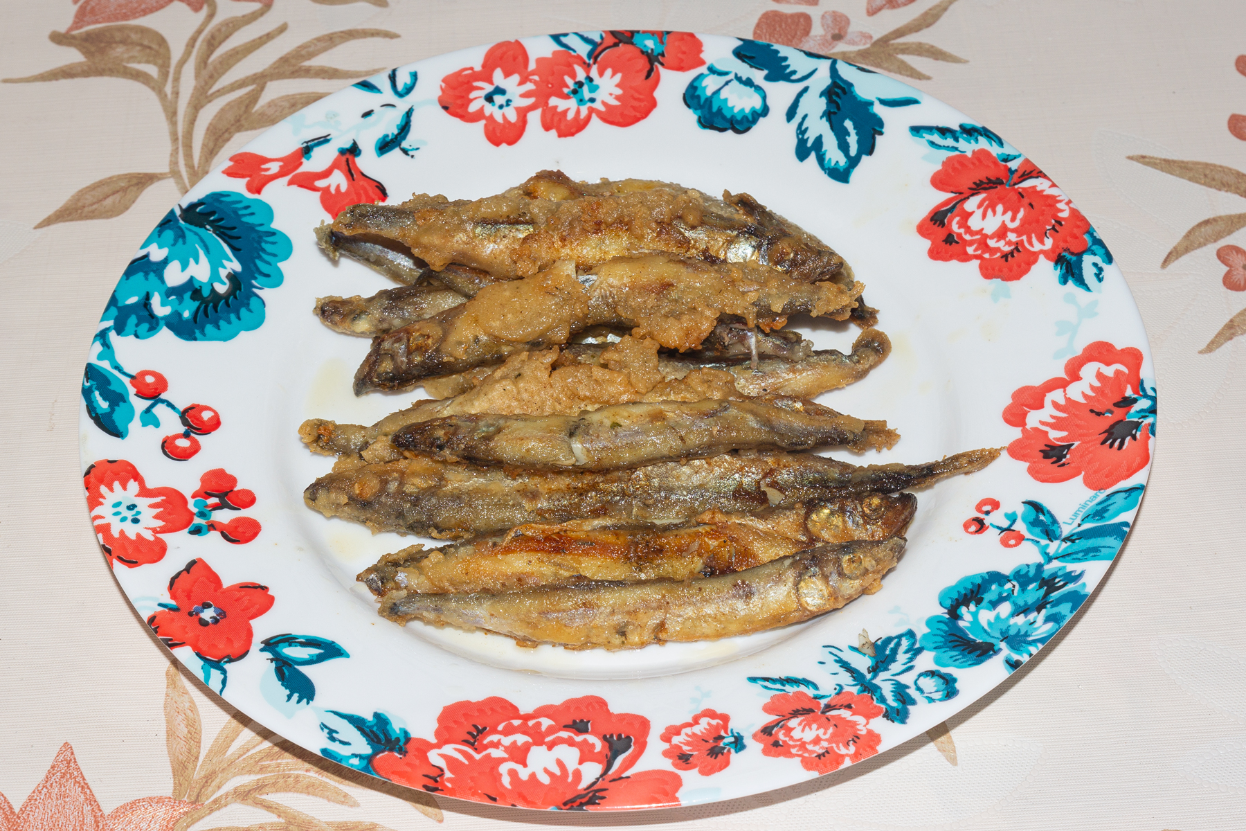 Фото к рецепту Мойва, запеченная в духовке Мойва, запеченная в духовке