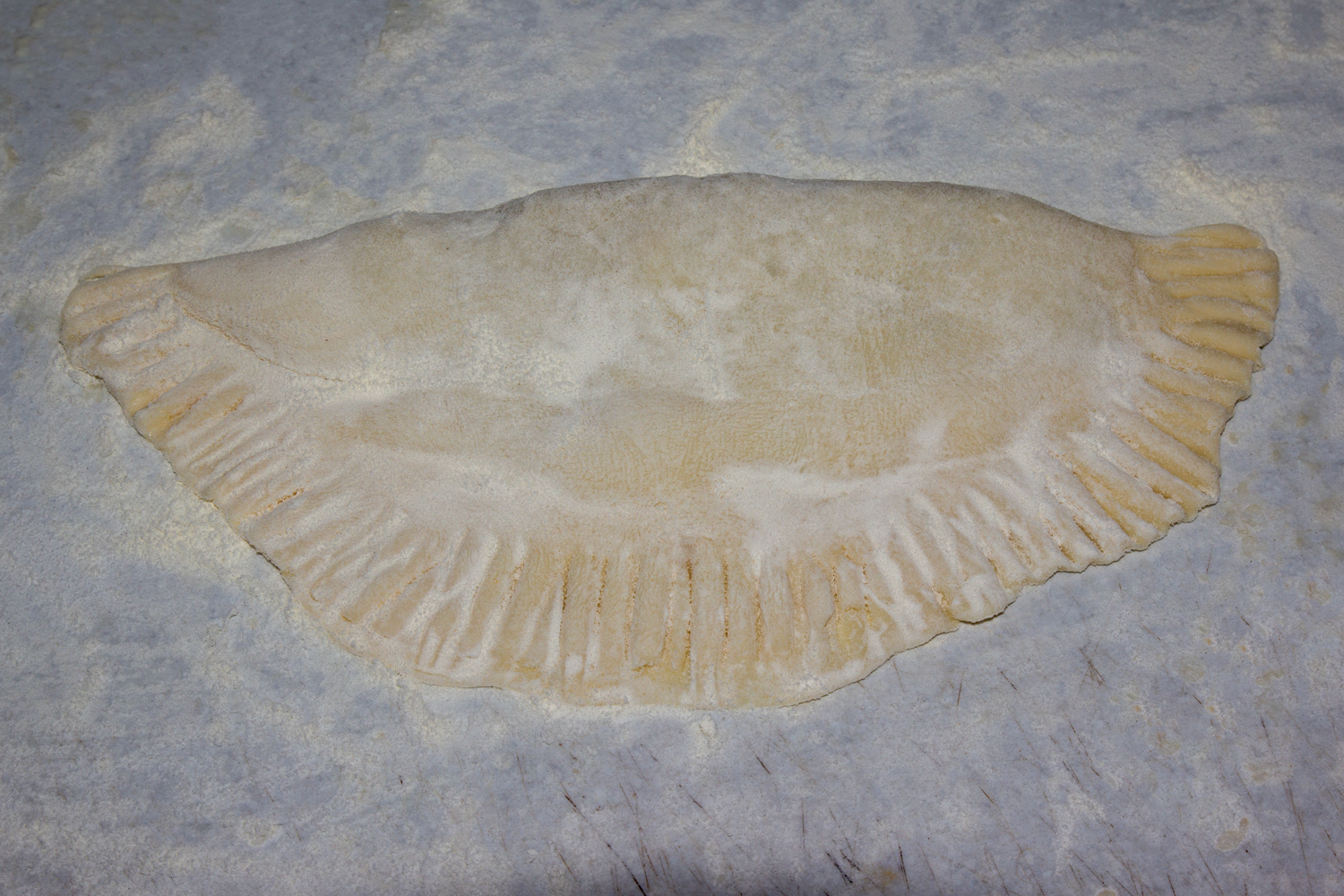 сформированный чебурек по рецепту Чебуреки в аэрогриле