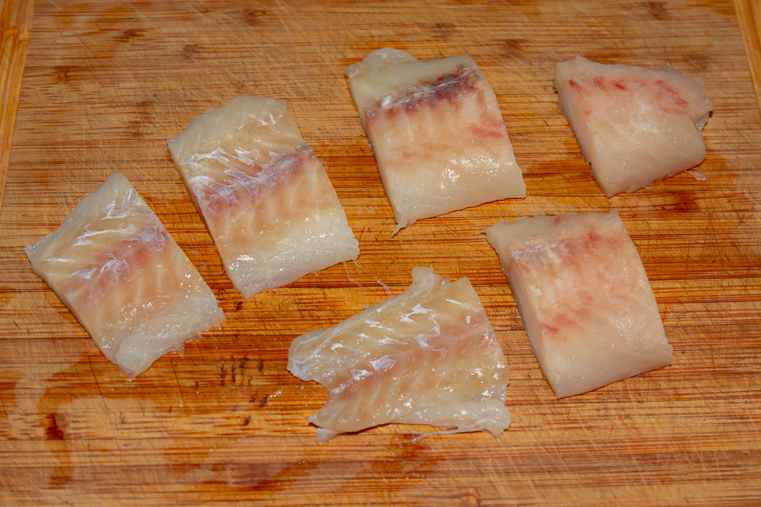 рыба нарезанная кусочками по рецепту Минтай запеченный в сметане