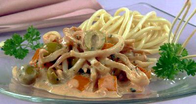 Фото к рецепту Кальмары, тушенные с оливками Кальмары, тушенные с оливками