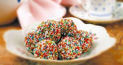 Фото к рецепту Ореховые шарики в карамели Ореховые шарики в карамели