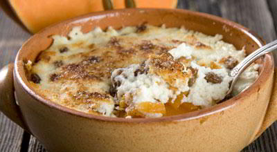 Фото к рецепту Тыква, запечённая с творогом Тыква, запечённая с творогом